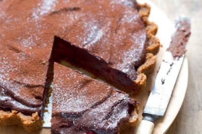 Tarte au chocolat truffée aux framboises